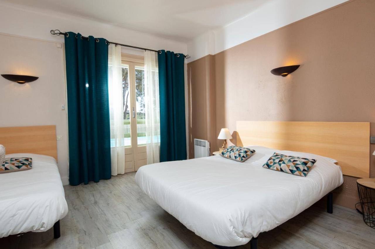 Hotel Les Rocailles Montagnac  Bagian luar foto